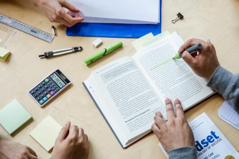 three-students-working-flatlay